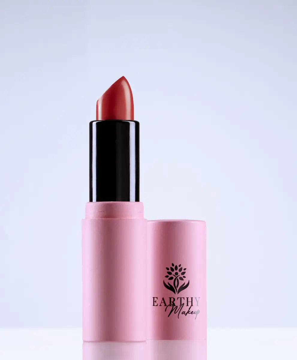 A single red lipstick uncapped, the earthy love color